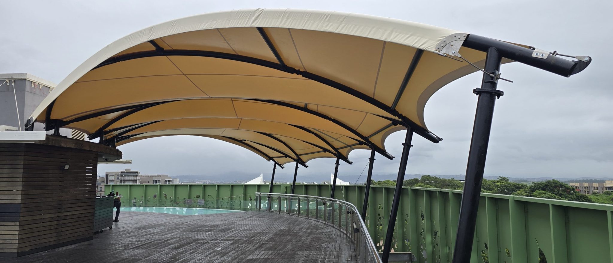 Custom rooftop pool deck cover designed and installed by RAK Structures for Gateway Hotel in Umhlanga