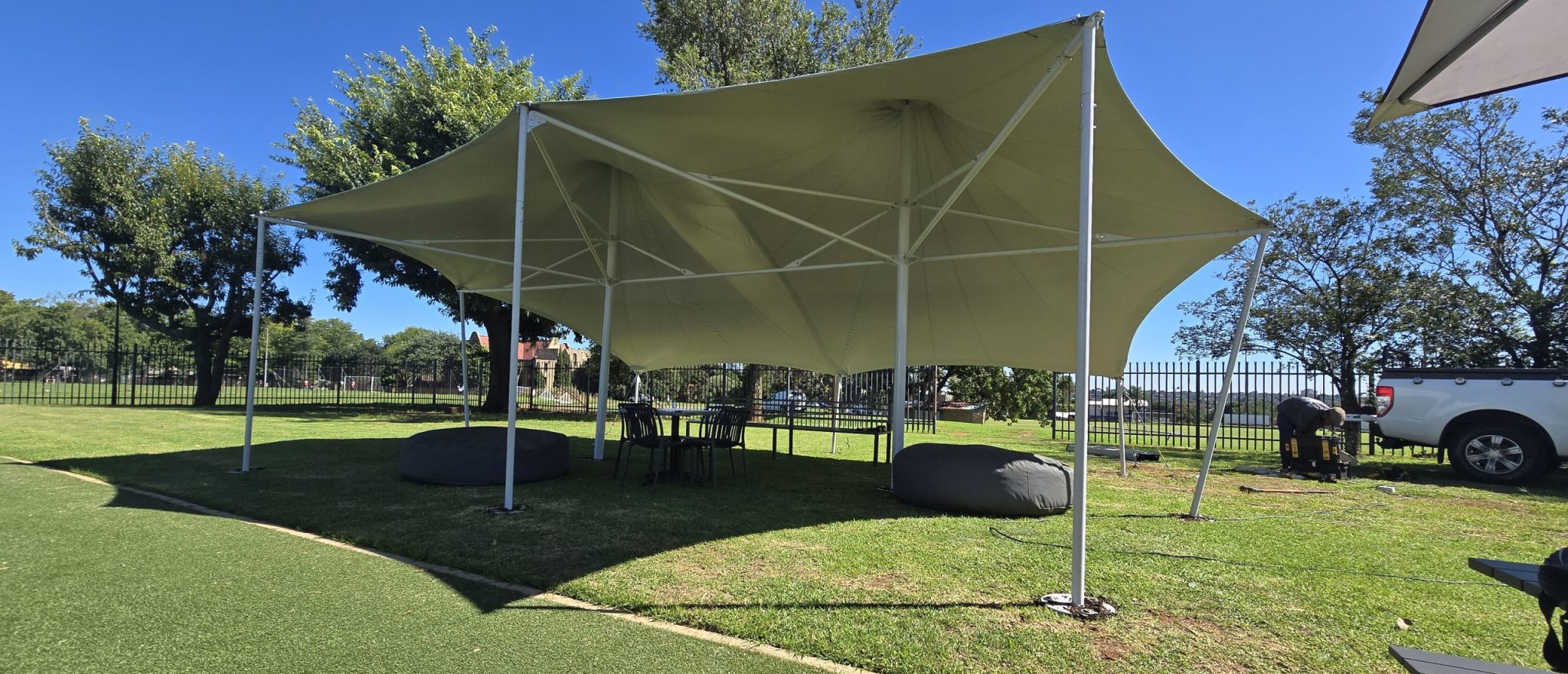 Custom tensile shade cover installed by RAK Structures for Virgin Active Padel courts in Bedfordview