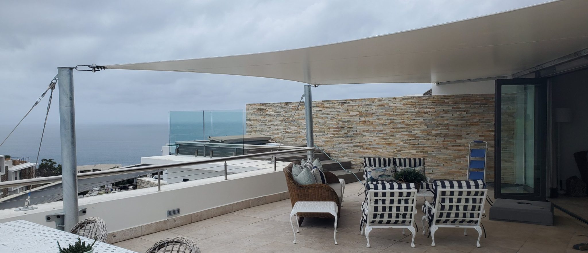 Custom shade sail patio cover by RAK Structures installed at a private residence