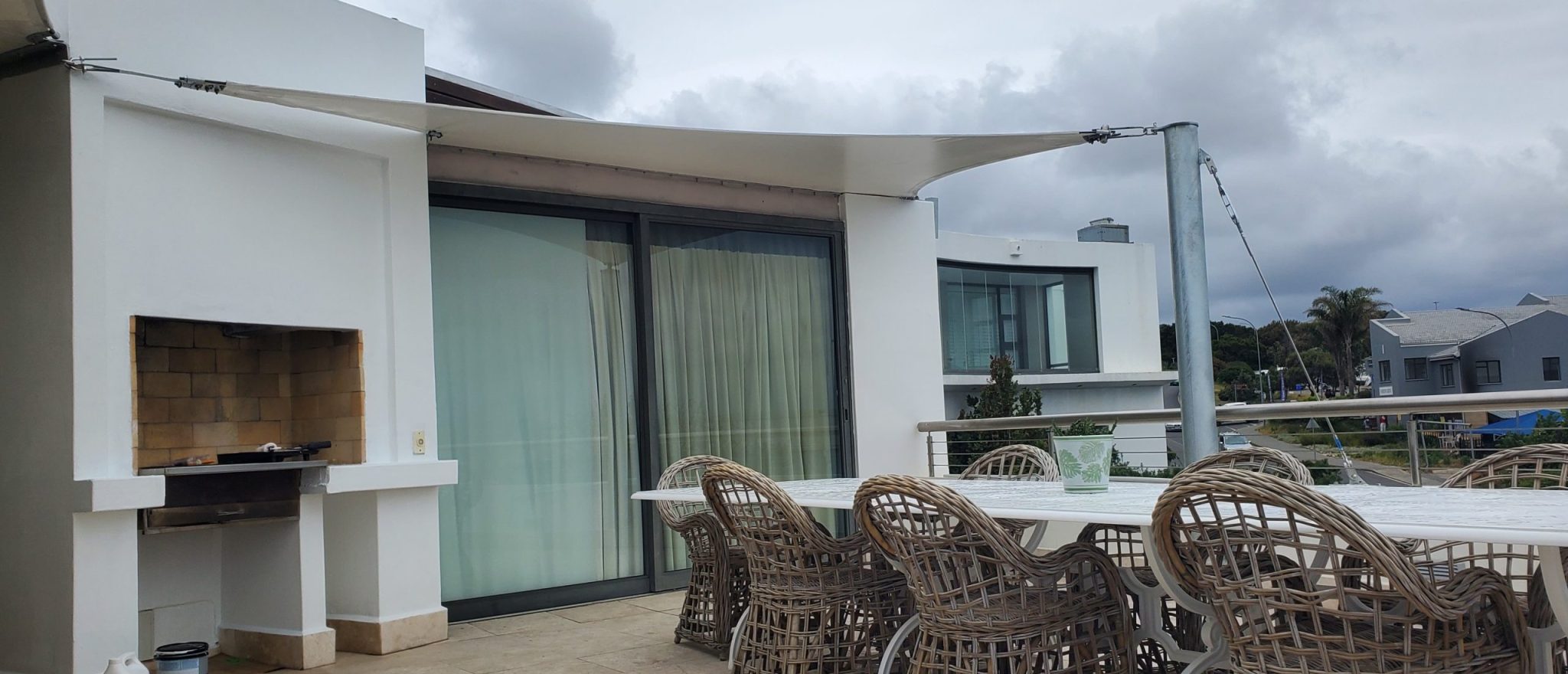 Custom shade sail patio cover by RAK Structures installed at a private residence