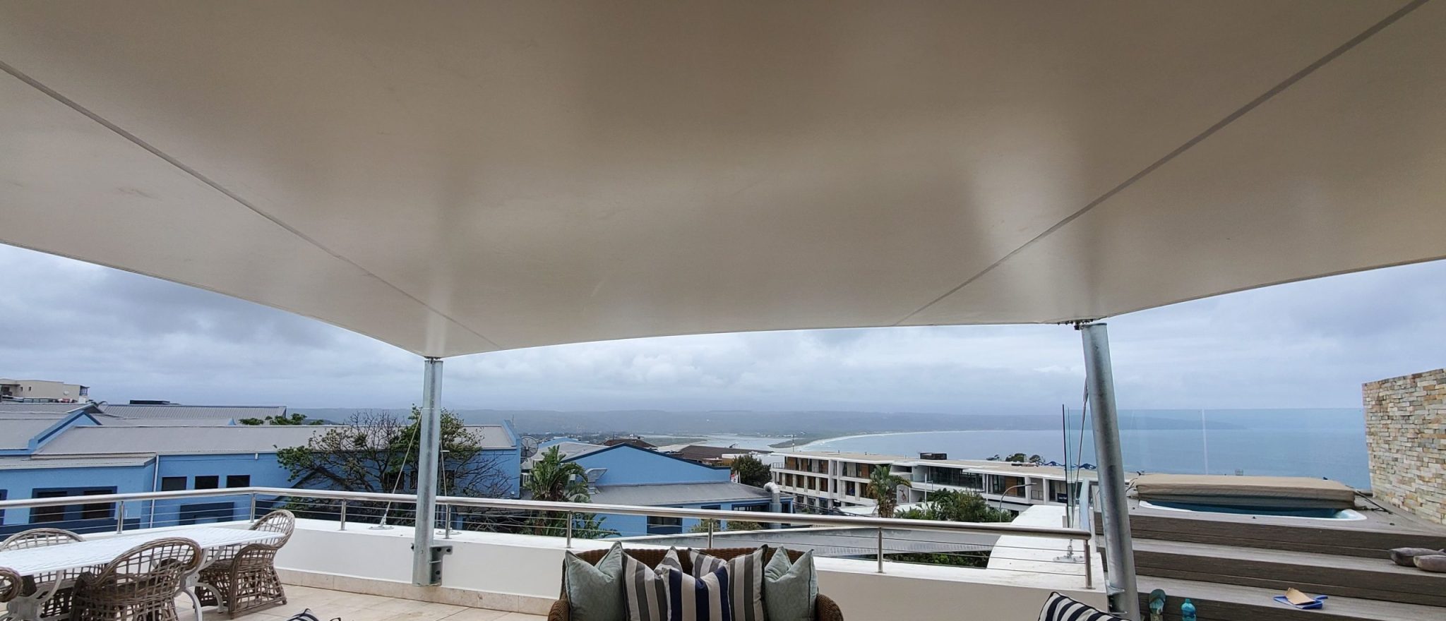 Custom shade sail patio cover by RAK Structures installed at a private residence