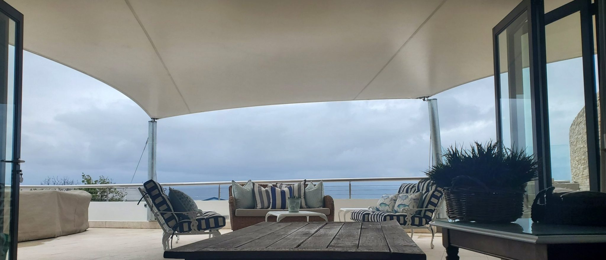 Custom shade sail patio cover by RAK Structures installed at a private residence
